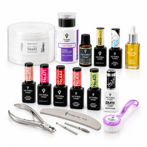 A comprehensive nail care and manicure set from Victoria Vynn, featuring multiple bottles of gel polish in various colors, a white nail file, nail clippers, a brush, and a swab container, all arranged on a clean white background.