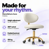 Manufakturo Aura Creamy beauty stool with gas-lift height adjustment, 360-degree swivel, padded backrest, gold five-spoke base, five castors and 150 kg maximum load.