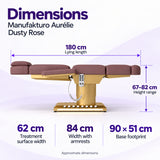 Manufakturo Aurélie Dusty Rose beauty bed dimensions: 180 cm length, 62 cm treatment surface width, 84 cm width with armrests, 67–82 cm height and 90 x 51 cm base footprint.