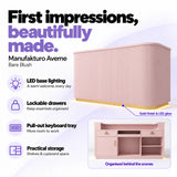 Manufakturo Averne Bare Blush reception desk with LED base lighting, lockable drawers, pull-out keyboard tray and shelves and cupboard storage.