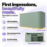 Manufakturo Averne Olive reception desk with LED base lighting, lockable drawers, pull-out keyboard tray and shelves and cupboard storage.