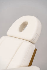 Manufakturo Étoile Electric Lash Beauty Bed - 3 Motors Creamy - displayed in a professional treatment-room setting