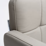 Manufakturo Serenity Salon Chair - 360-Degree Rotation Gold Base Black - close-up of the upholstery and construction details