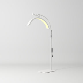 Manufakturo Beauty Lash LED Moonlight - Adjustable Colour Temp & Intensity White - LED treatment lamp with adjustable light arms on a white background