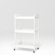 Manufakturo Beauty Trolley Assistant on Wheels White - displayed in a professional treatment-room setting