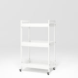 Manufakturo Beauty Trolley Assistant on Wheels White - displayed in a professional treatment-room setting