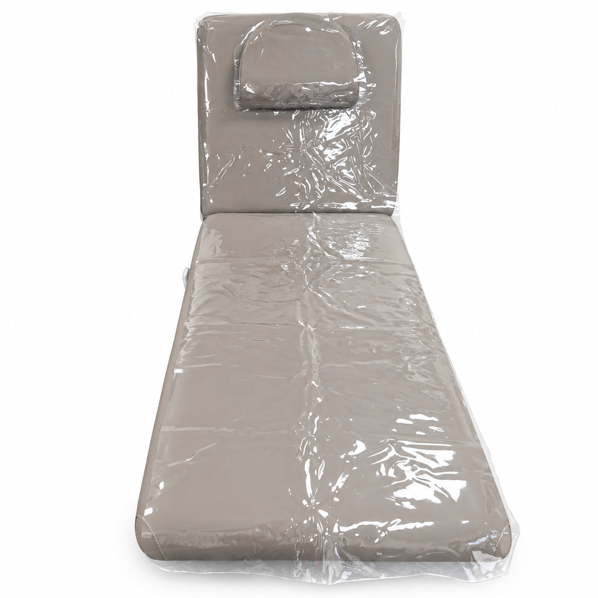 Clear protective covers on the Manufakturo Chérie bed with its headrest cushion fitted, on a white background