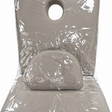 Chérie clear backrest cover around the face aperture with the separate covered cushion resting on the seat