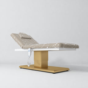 Clear protective cover set fitted to the Manufakturo Chérie Stone Taupe bed with its headrest cushion, shown in the original catalogue view
