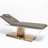Manufakturo Chérie Deep Ash electric massage bed — full product studio view with raised backrest and gold base.