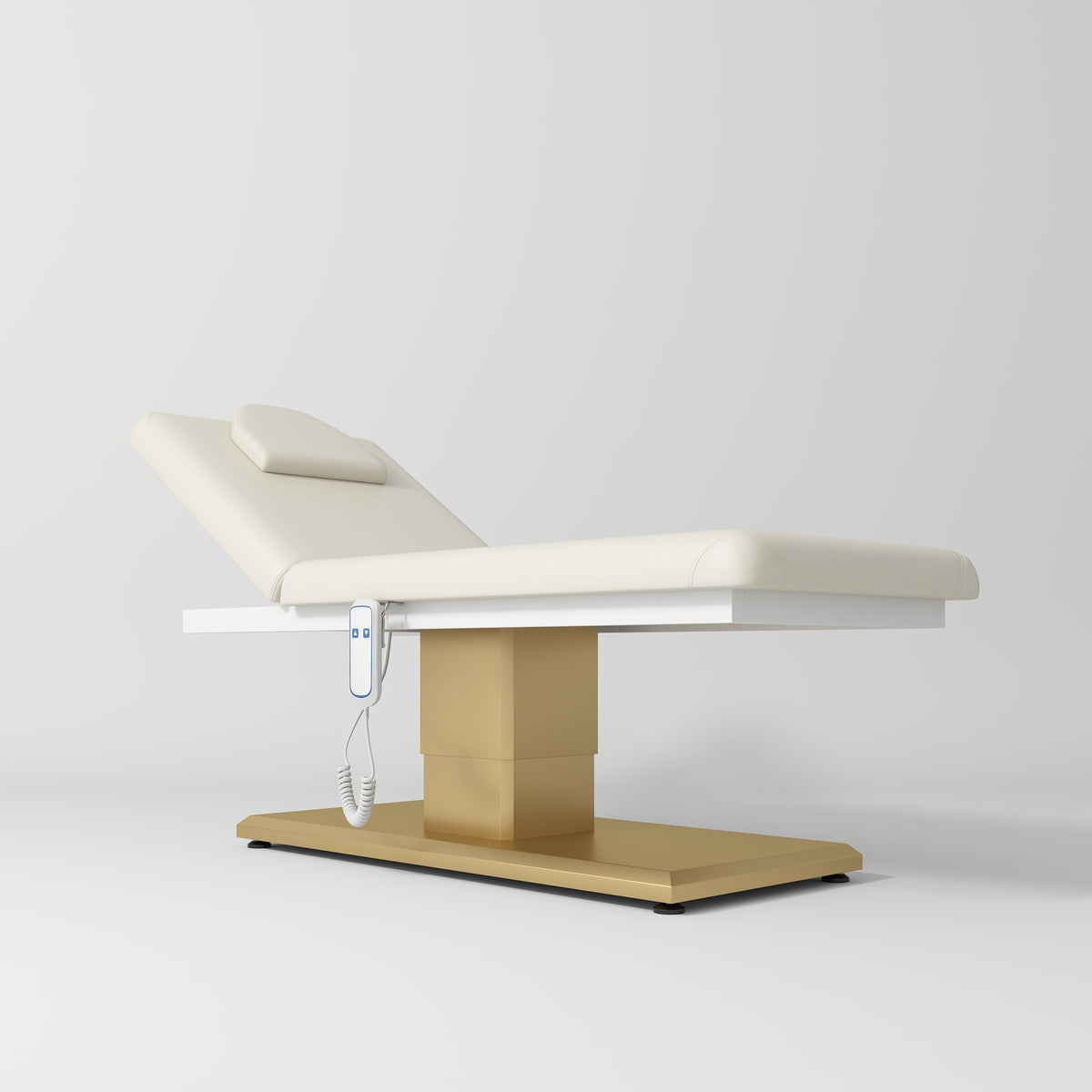Manufakturo Chérie Premium Electric Massage Bed - Creamy - displayed in a professional treatment-room setting