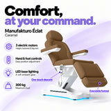 Manufakturo Éclat Caramel electric beauty bed with three electric motors, hand and foot controls, LED base lighting, 300 kg maximum load, one-touch descent, an extendable footrest and a solid one-piece headrest.