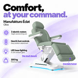 Manufakturo Éclat Olive electric beauty bed with three electric motors, hand and foot controls, LED base lighting, 300 kg maximum load, one-touch descent, an extendable footrest and a solid one-piece headrest.