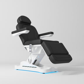 Manufakturo Éclat Salon Beauty Bed with Footrest Controls Black - close-up of the upholstery and construction details