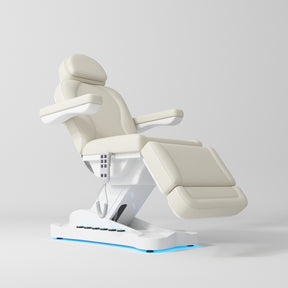 Manufakturo Éclat Salon Beauty Bed with Footrest Controls Creamy - close-up of the upholstery and construction details
