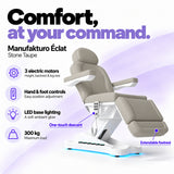 Manufakturo Éclat Stone Taupe electric beauty bed with three electric motors, hand and foot controls, LED base lighting, 300 kg maximum load, one-touch descent, an extendable footrest and a solid one-piece headrest.