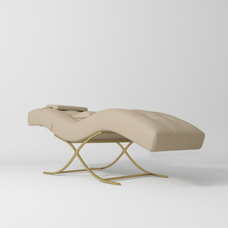 Manufakturo Elegance Lash Bed - Gold Frame & Adjustable Headrest Warm Beige - displayed in a professional treatment-room setting