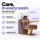 Manufakturo Élise Dusty Rose hair salon backwash unit with a white tilting ceramic basin, hot and cold mixer, hand shower and padded armrests.
