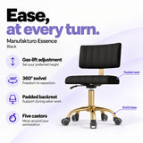 Manufakturo Essence Black beauty chair with gas-lift height adjustment, 360-degree swivel, padded backrest and five castors on a gold base.