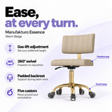 Manufakturo Essence Warm Beige beauty chair with gas-lift height adjustment, 360-degree swivel, padded backrest and five castors on a gold base.