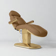 Manufakturo Étoile Caramel electric beauty bed in the original catalogue composition and grey background, with updated eight-button hand-held controller.