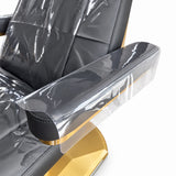 Close-up of the Étoile clear armrest protector with a free draping edge and gold trim