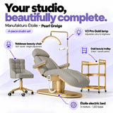 Manufakturo Étoile Pearl Greige four-piece complete studio set: electric beauty bed with three motors and LED base, Noblesse swivel beauty chair, V3 Pro Gold adjustable treatment lamp and three-tier gold beauty trolley.