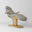 Manufakturo Étoile Pearl Greige electric beauty bed in the original catalogue composition and grey background, with updated eight-button hand-held controller.