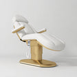 Manufakturo Étoile White electric beauty bed in the original catalogue composition and grey background, with updated eight-button hand-held controller.