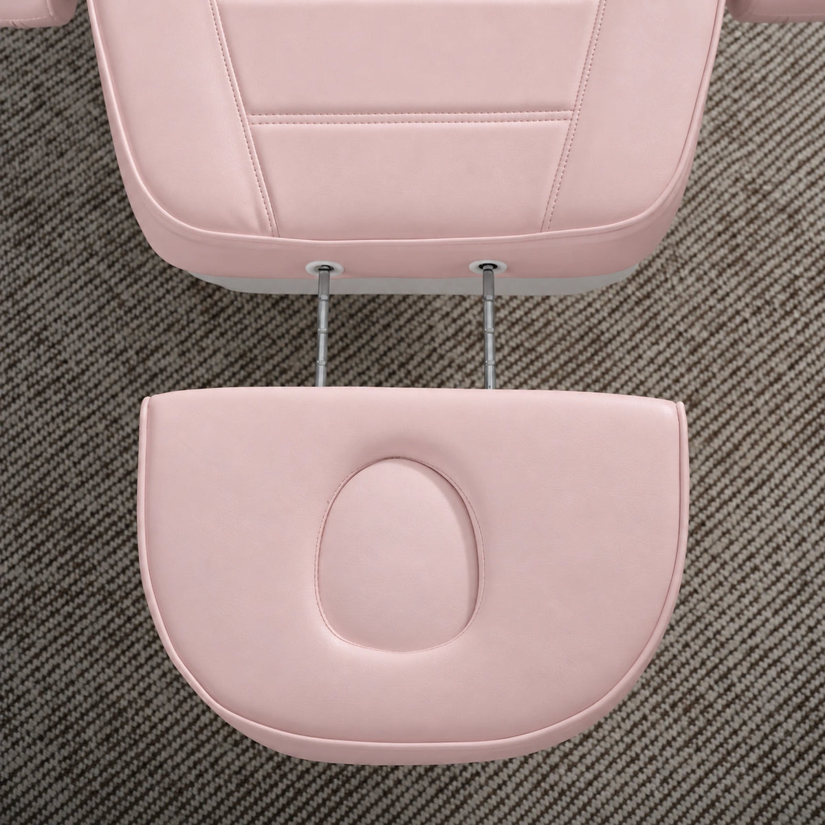 Manufakturo Grace Bare Blush electric beauty bed extended headrest with fitted face insert and two metal adjustment rods.