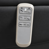 Manufakturo Grace Black electric beauty bed hand-held control with the original buttons and indicator, against matching upholstery.
