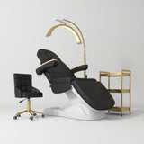 Manufakturo Grace Black The Complete Salon Set - Beauty Bed, Chair, Moonlight & Trolley - coordinated furniture pieces arranged on a white background