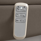 Manufakturo Grace Cocoa Mocha electric beauty bed hand-held control with the original buttons and indicator, against matching upholstery.