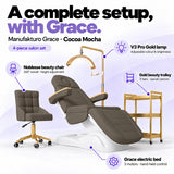 Manufakturo Grace Cocoa Mocha four-piece salon set features: three-motor electric bed with hand-held control, Noblesse swivel chair, adjustable V3 Pro Gold lamp and three-tier gold trolley.
