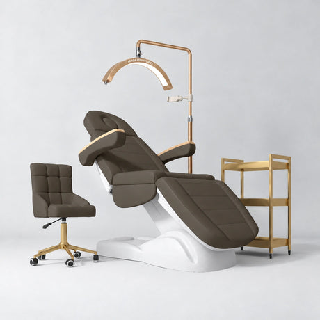 Manufakturo Grace Cocoa Mocha complete salon set with electric beauty bed, Noblesse chair, V3 Pro Gold treatment lamp and three-tier gold trolley.