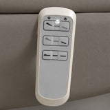 Manufakturo Grace Deep Ash electric beauty bed hand-held control with the original buttons and indicator, against matching upholstery.