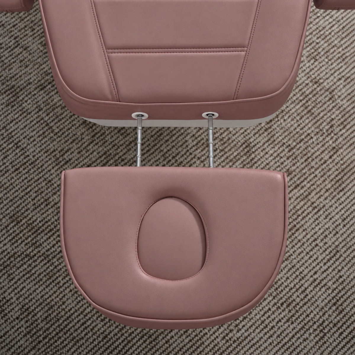 Manufakturo Grace Dusty Rose electric beauty bed extended headrest with fitted face insert and two metal adjustment rods.