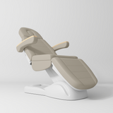 Manufakturo Grace Electric Beauty Bed - 3 Motors Stone Taupe - displayed in a professional treatment-room setting