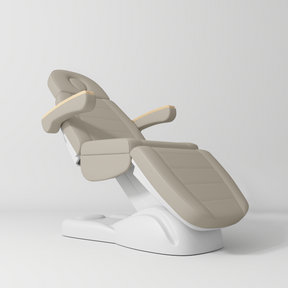 Manufakturo Grace Electric Beauty Bed - 3 Motors Stone Taupe - displayed in a professional treatment-room setting