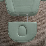 Manufakturo Grace Olive electric beauty bed extended headrest with fitted face insert and two metal adjustment rods.