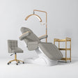 Manufakturo Grace Pearl Greige complete salon set with electric beauty bed, Noblesse chair, V3 Pro Gold treatment lamp and three-tier gold trolley.