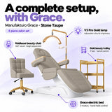 Manufakturo Grace Stone Taupe four-piece salon set features: three-motor electric bed with hand-held control, Noblesse swivel chair, adjustable V3 Pro Gold lamp and three-tier gold trolley.