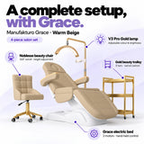 Manufakturo Grace Warm Beige four-piece salon set features: three-motor electric bed with hand-held control, Noblesse swivel chair, adjustable V3 Pro Gold lamp and three-tier gold trolley.