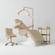 Manufakturo Grace Warm Beige complete salon set with electric beauty bed, Noblesse chair, V3 Pro Gold treatment lamp and three-tier gold trolley.