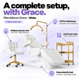 Manufakturo Grace White four-piece salon set features: three-motor electric bed with hand-held control, Noblesse swivel chair, adjustable V3 Pro Gold lamp and three-tier gold trolley.