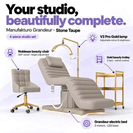 Manufakturo Grandeur Stone Taupe four-piece complete studio set: electric beauty bed with three motors and LED base, Noblesse swivel beauty chair, V3 Pro Gold adjustable treatment lamp and three-tier gold beauty trolley.