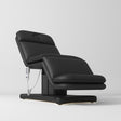 Manufakturo Heated Imperial Signature Electric Beauty Bed Black - displayed in a professional treatment-room setting