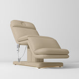 Manufakturo Heated Imperial Signature Electric Beauty Bed Warm Beige - displayed in a professional treatment-room setting