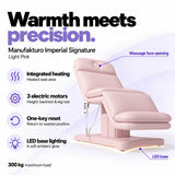 Manufakturo Imperial Signature heated electric beauty bed in Light Pink, showing seat heating, three motors, one-key reset and LED base lighting.