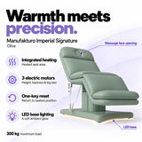 Manufakturo Imperial Signature heated electric beauty bed in Olive, showing seat heating, three motors, one-key reset and LED base lighting.